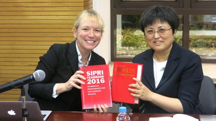 Dr Wu Chunsi, Director of the Institute of International Strategic Studies at the Shanghai Institutes for International Studies, and SIPRI's Dr Lora Saalman present the SIPRI Yearbook 2016 and the Chinese translation of SIPRI Yearbook 2015