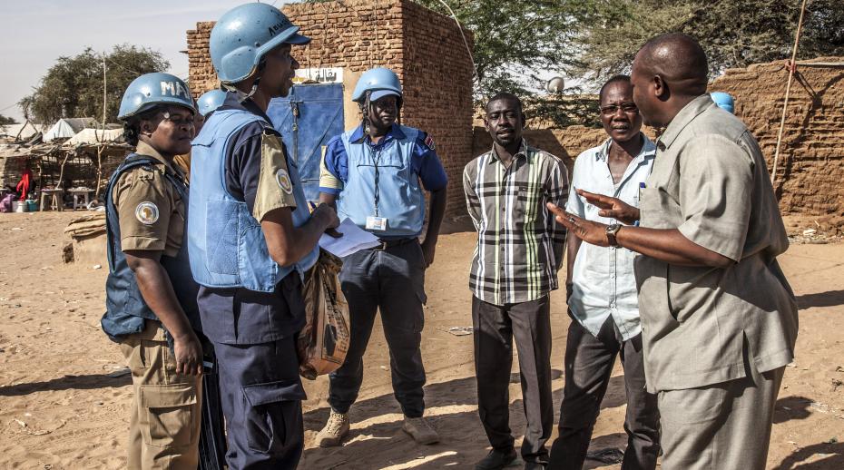 UNAMID peacekeepers interact with community leaders in Zam Zam Camp for internally displaced people near El Fasher, North Darfur, during a daily patrol.