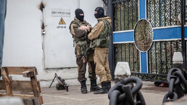 Russian troops block the Ukrainian fleet headquarters in Sevastopol, Crimea, 2014. Photo: AlexandCo Studio / Shutterstock