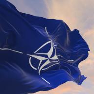 NATO flag waving in the wind.