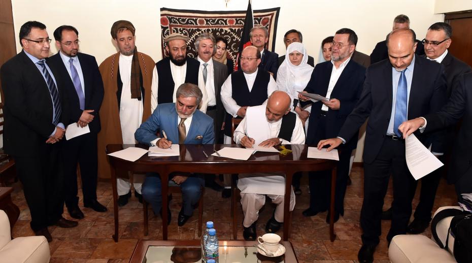 Afghan presidential candidates Abdullah Abdullah and Ashraf Ghani sign the Joint Declaration of the Electoral Teams in Kabul, Afghanistan in 2014